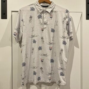 Travis Mathew White Polo with Blue and Red Accents